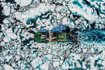 Drone shot of icebreaker in a sea of ice